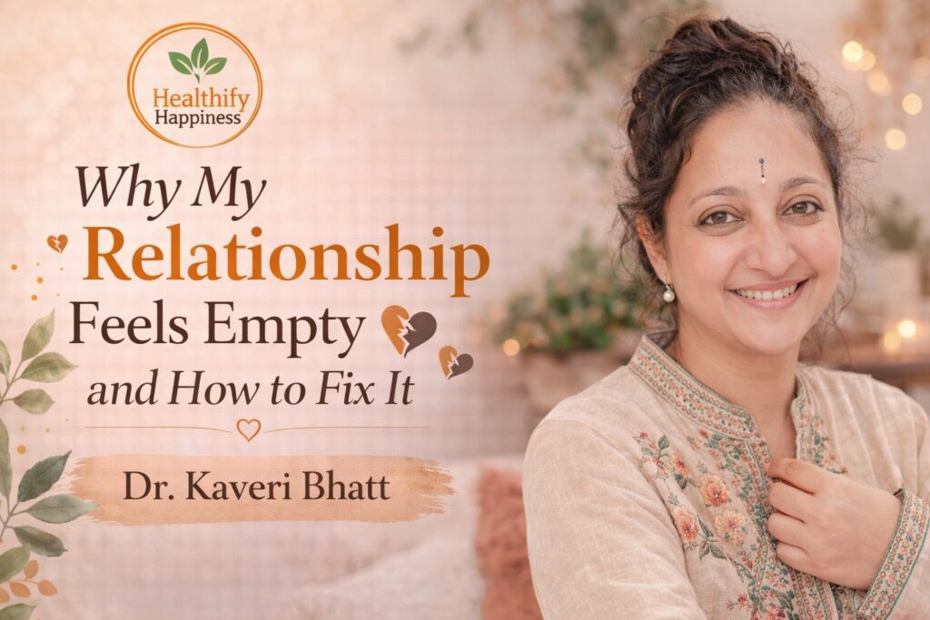 A couple sitting silently apart showing emotional distance while reflecting why my relationship feels empty and how to rebuild connection